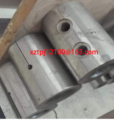 Paving machine winch shaft sleeve, shaft head slee