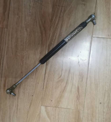 Paver engine hood gas spring 2559415
