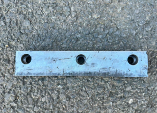 Tailgate scraper of milling machine