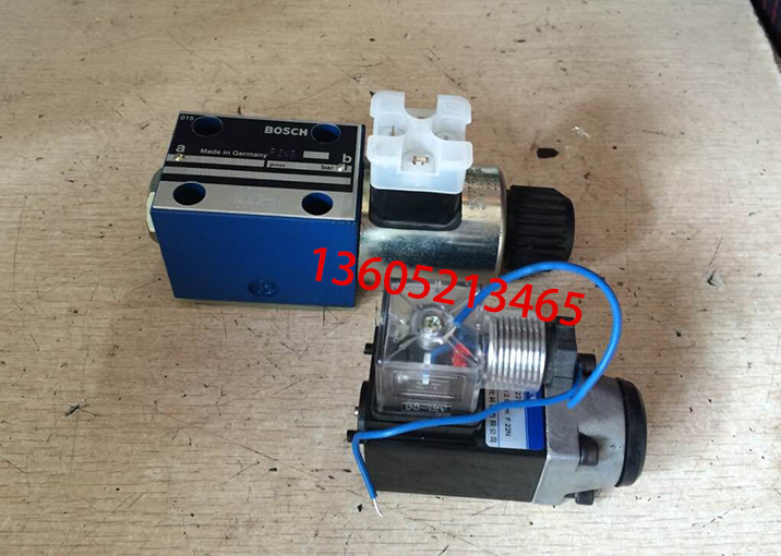 Spreader leveling oil cylinder solenoid valve asse