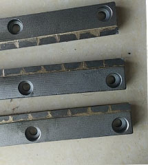 Rear door scraper of the milling machine (middle) 